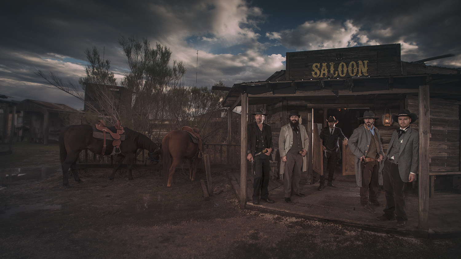 gang_of_men_outside_saloon_western